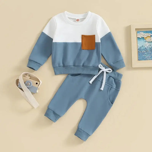 Get your little one in style with our Toddler Boys Contrast Color Pocket Sweatsuit Set. Made from 70% cotton, 22% polyester, and 8% spandex.