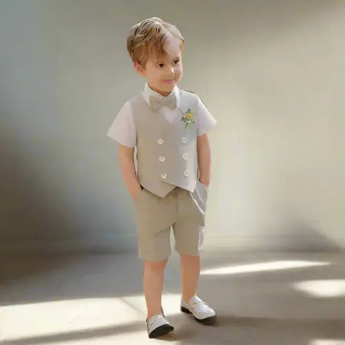 Get ready for some serious style with our Boys Fashion Vest-Shorts-Bowtie-Flower 4PC Sets!