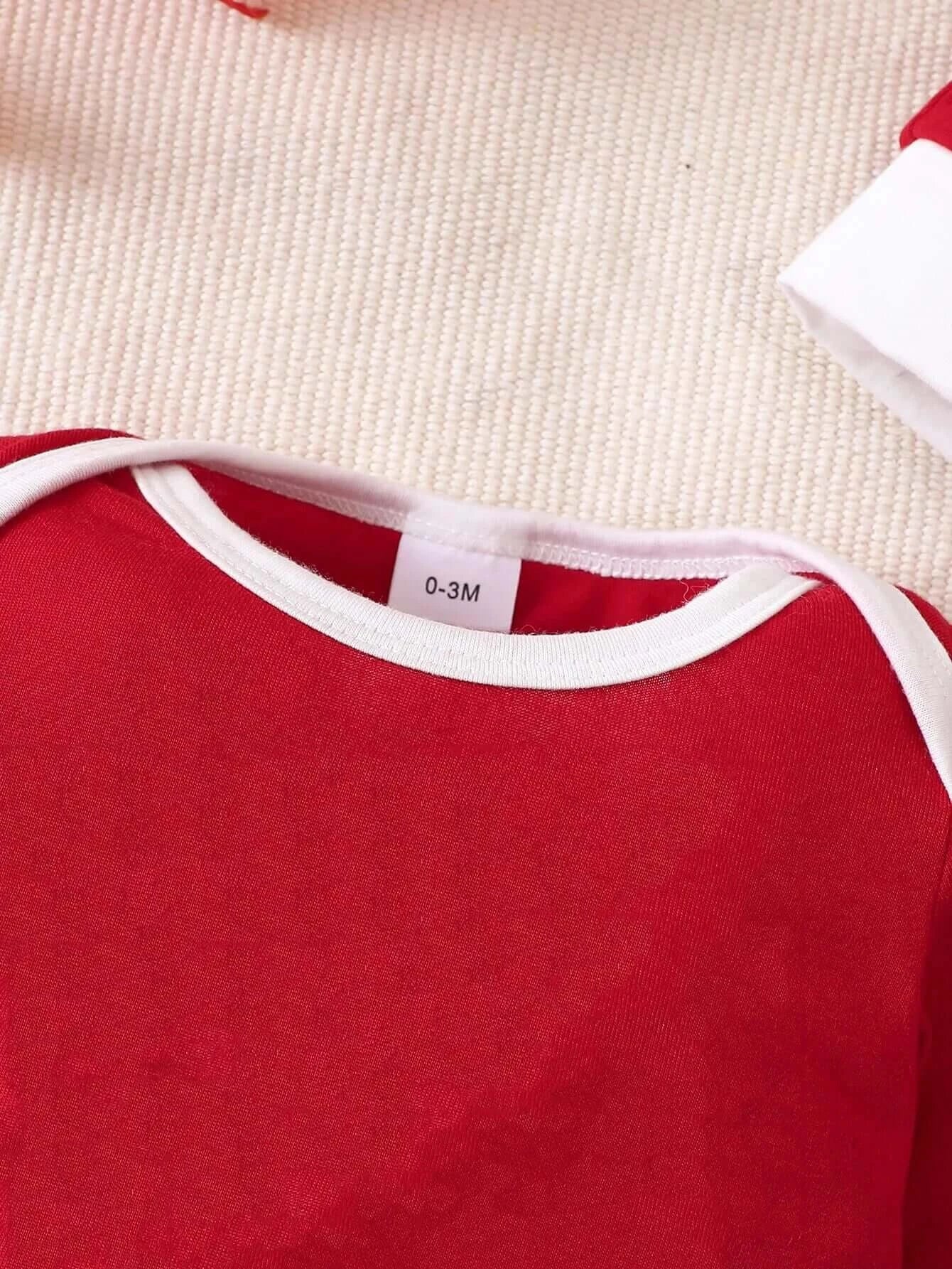 Introduce your little one to the holiday season in style with this adorable Newborn-Infant MY FIRST CHRISTMAS Romper With Hat!