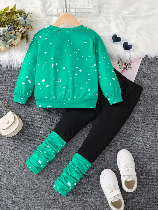 Get your little girl ready for spring with this adorable Girls Fashion Cartooned Long Sleeved Top and Black Pants!