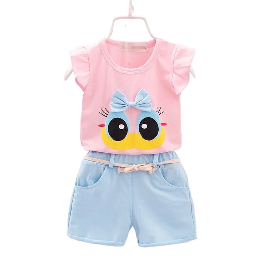 The Summer Toddler Girls Big-Eyed Top and Matching Shorts are made from soft, breathable material and feature a cute cartoon pattern.