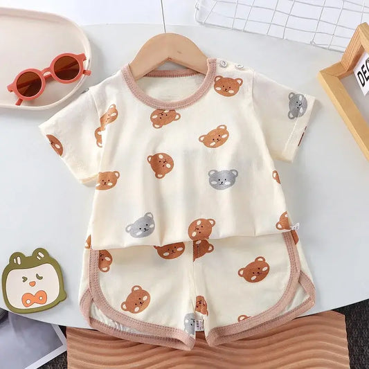 Get your little one ready for summer with our cute Summer Toddler Boys Cartoon Bear T-Shirt-Shorts! Made with soft combed cotton.
