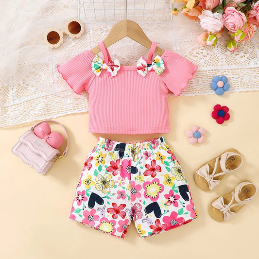 This Summer Toddler Girls Off Shoulder Top-Charming Floral Shorts features an off shoulder top and matching shorts. Made with POLYESTER and SPANDEX.
