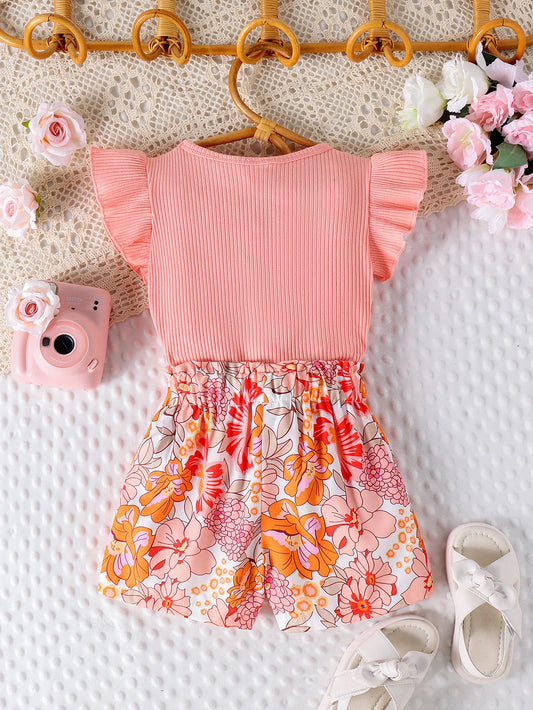 This Summer Girls Sweet Butterfly Sleeve Top-Printed Shorts is a cute choice Featuring a butterfly sleeve top and floral shorts, perfect for summer.