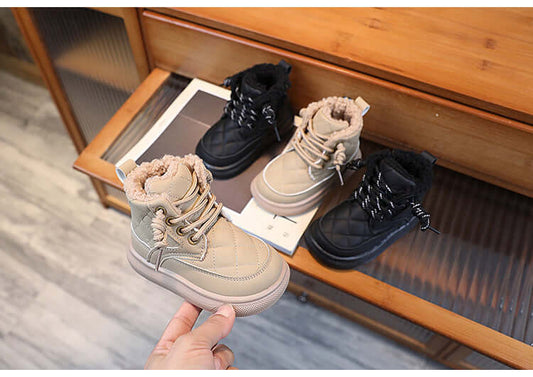 Winter Kids Leather Waterproof Snow Boots Featuring anti-slip technology and sturdy sewing, these round-toe boots will keep your little ones safe and stylish.