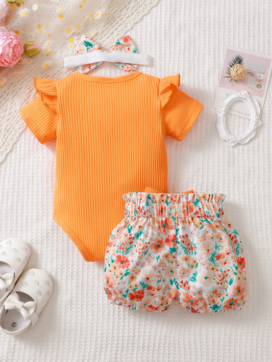 Get your little girl ready for summer with our adorable Summer Newborn Girls Short Sleeved Onesie With Print Shorts!