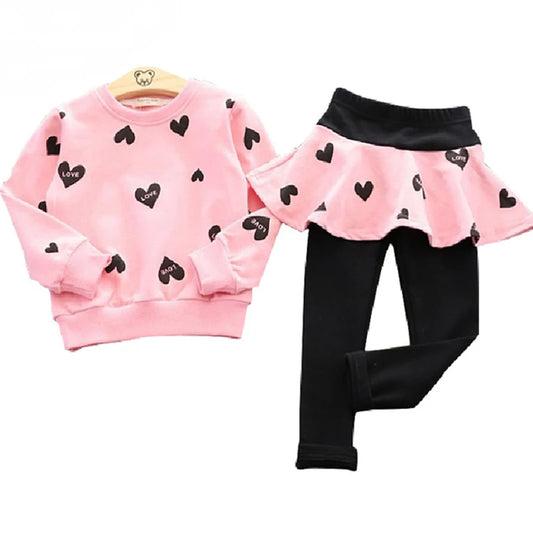 Dress your little sweetheart in this adorable Toddler Girls Autumn Heart Sweatshirt-Skirt Leggings featuring a heart-print sweatshirt, skirt, and leggings made from soft polyester.