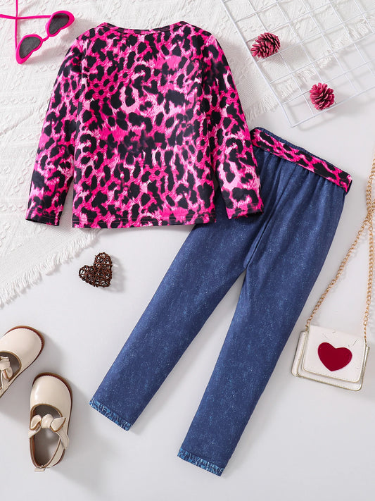 Roar into style with this playful Girls Autumn Pink Leopard Top With Denim Jeans! The cozy long sleeve top pairs perfectly with trendy denim jeans.