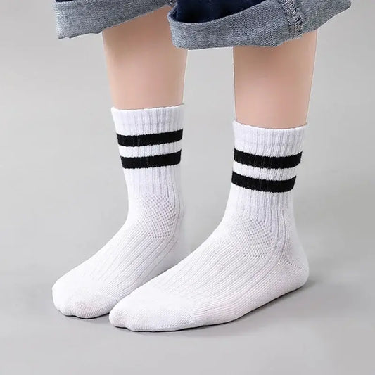 Introducing Kids Cotton Striped Sports Socks 3 Pairs, the perfect blend of comfort and style! These socks are perfect for every season.
