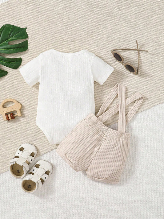 Keep your little one cool and comfy this summer with this adorable Summer Newborn Boys Patched Pocket Romper with Strap Shorts set.