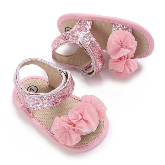Step into the world of luxury with our exquisite Newborn Girls Soft Sole Non-Slip First Walker Sandals.