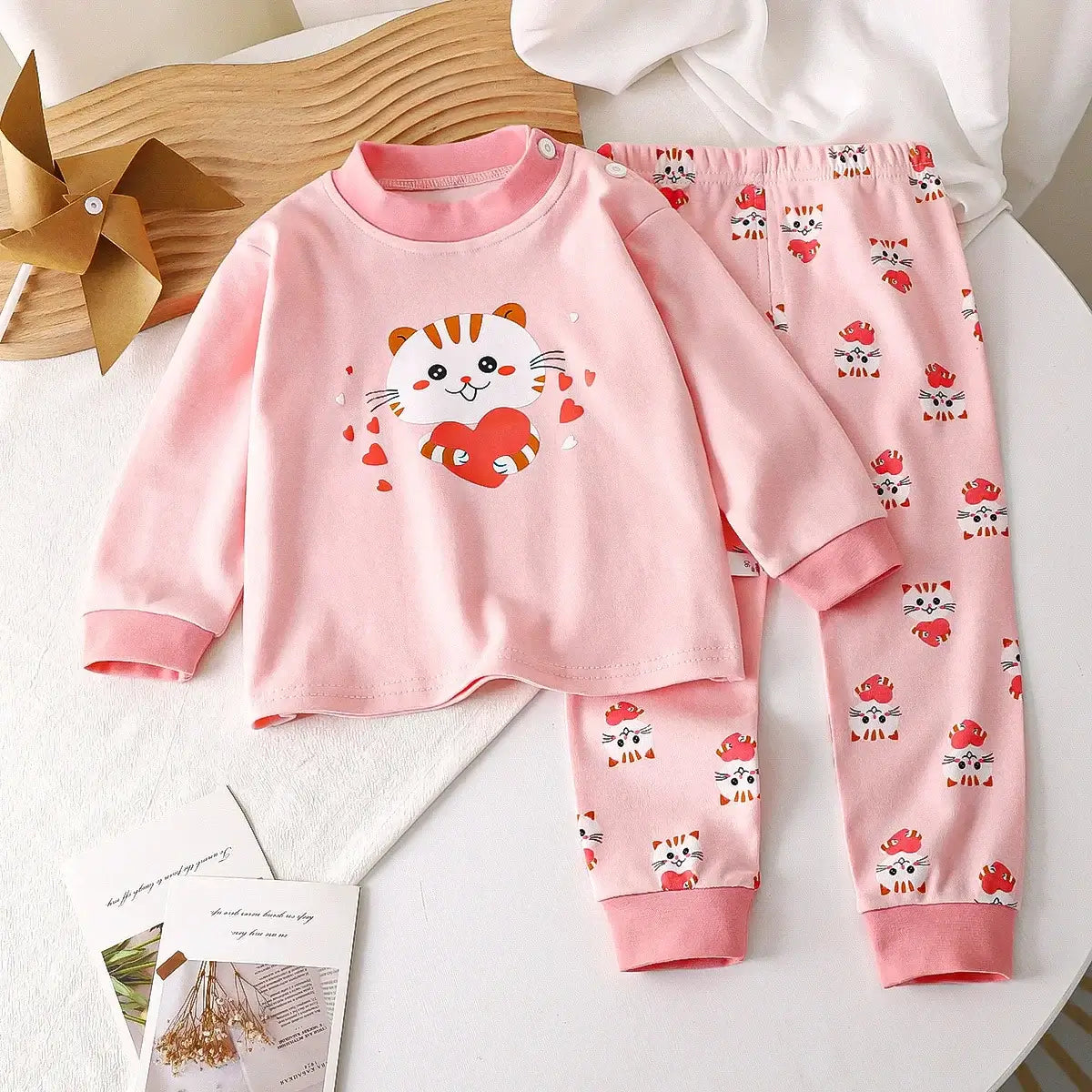 Keep your little one cozy and cute in this Autumn Toddlers Long Sleeve 2PC Pajama Set. Made from soft combed cotton, this Autumn Toddlers Long Sleeve 2PC Pajama Set is breathable enough to keep skin happy and irritation-free—because cranky jammies are no