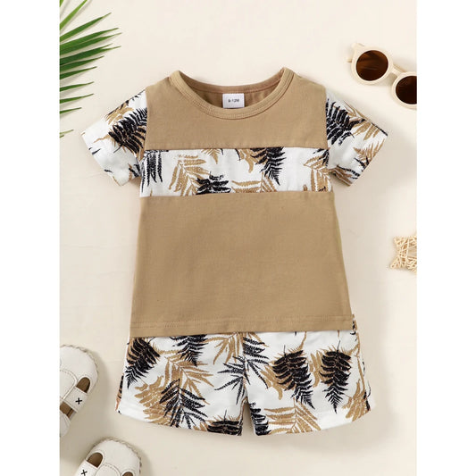 Upgrade your little one's summer wardrobe with this playful Summer Toddler Boys Short Sleeve Top with Shorts. Made from combed cotton and polyester.