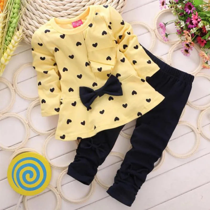 Dress your little girl in style with our Autumn Toddler Girls Long Sleeve Fashion Casual Bow Top + Pants set!