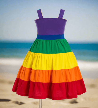 Get ready to make a colorful statement at your little one's birthday party with the Summer Girls Rainbow Birthday Party Dress!