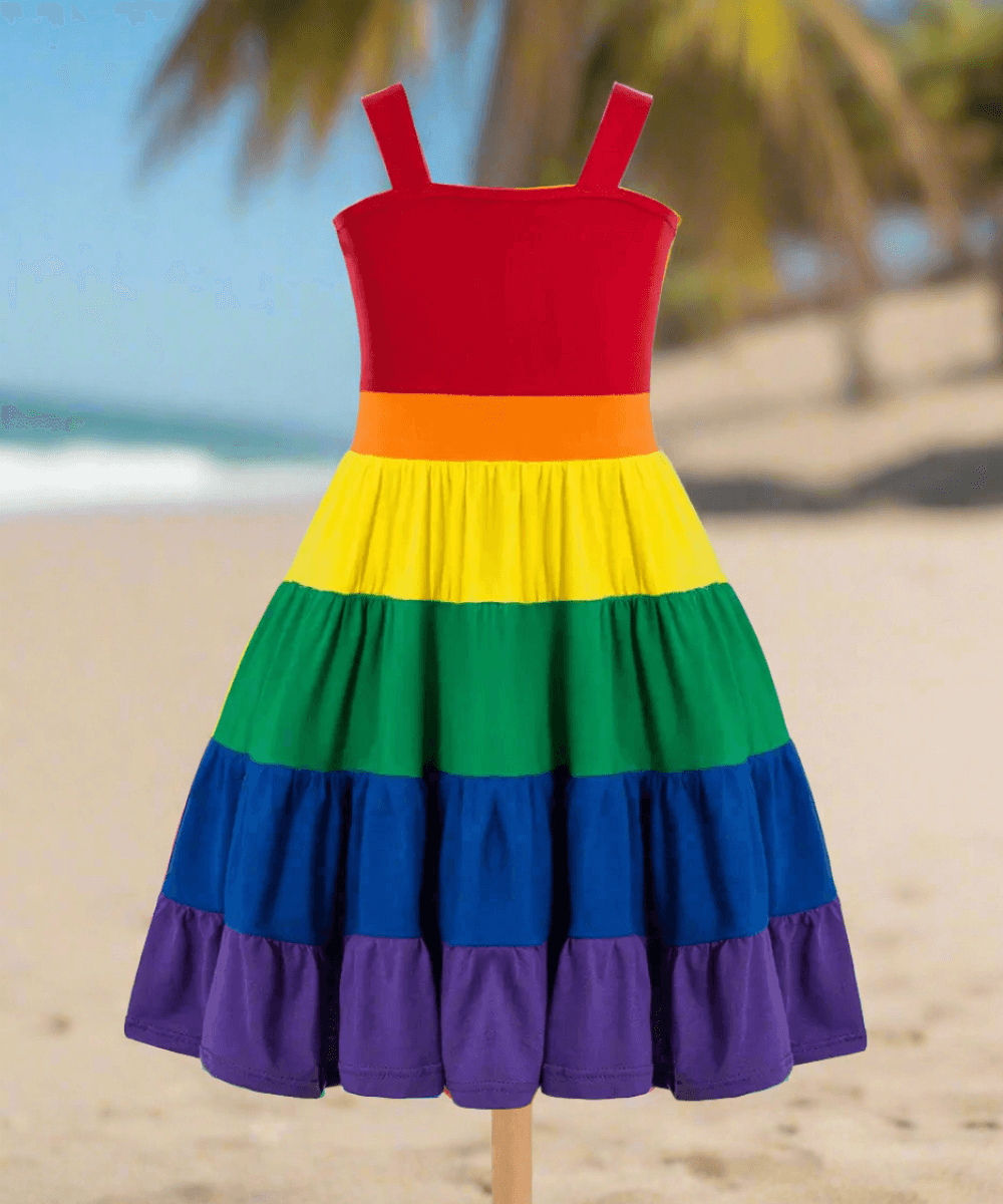 Get ready to make a colorful statement at your little one's birthday party with the Summer Girls Rainbow Birthday Party Dress!