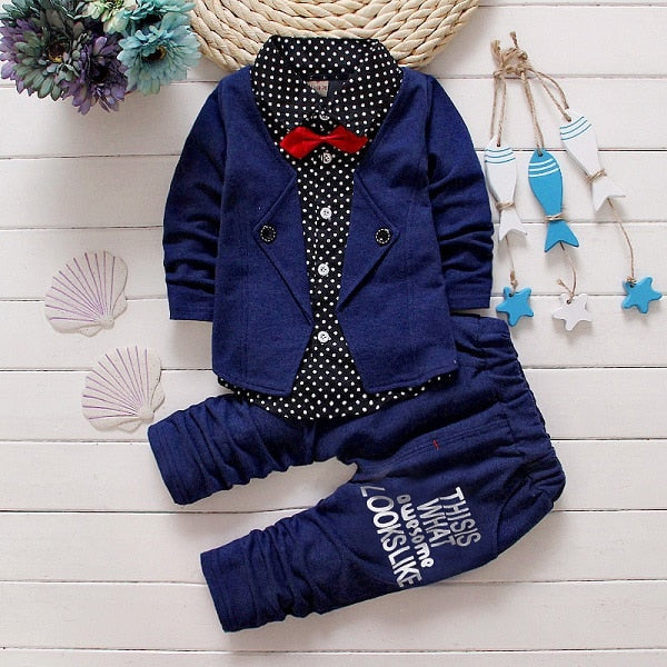 Dress your toddler to impress with this stylish long-sleeve, button-up shirt with bow tie and matched pants!