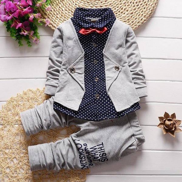 Dress your toddler to impress with this stylish long-sleeve, button-up shirt with bow tie and matched pants!