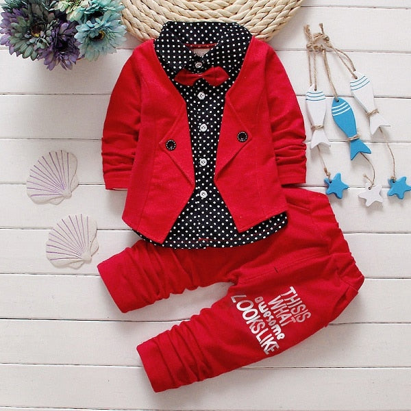 Dress your toddler to impress with this stylish long-sleeve, button-up shirt with bow tie and matched pants!