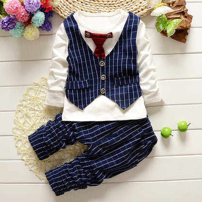 Dress your toddler to impress with this stylish long-sleeve, button-up shirt with bow tie and matched pants!