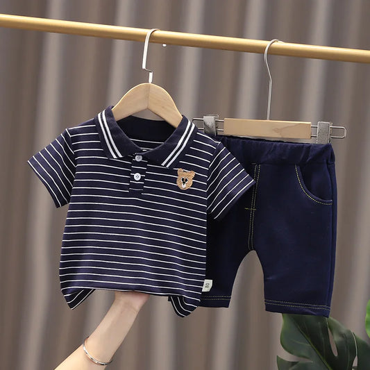 Upgrade your little one's wardrobe with our sophisticated Summer Toddler Boys Polo Shirt & Shorts 2PC Set.