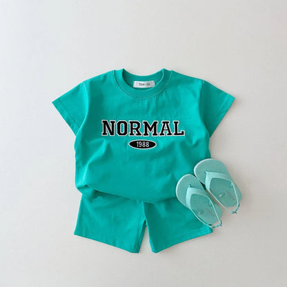 Get ready to have some FUN in the sun with our Summer Toddler Boys NORMAL Shorts Set!