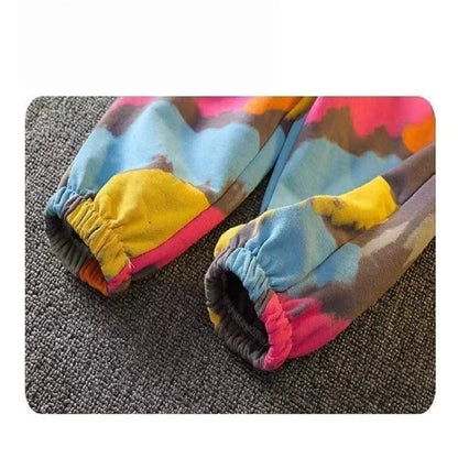 Dress your little one in this playful Toddler Boys Fashion Graffiti Sweater and Pants 2PC Set featuring a colorful graffiti print sweater and matching pants. 