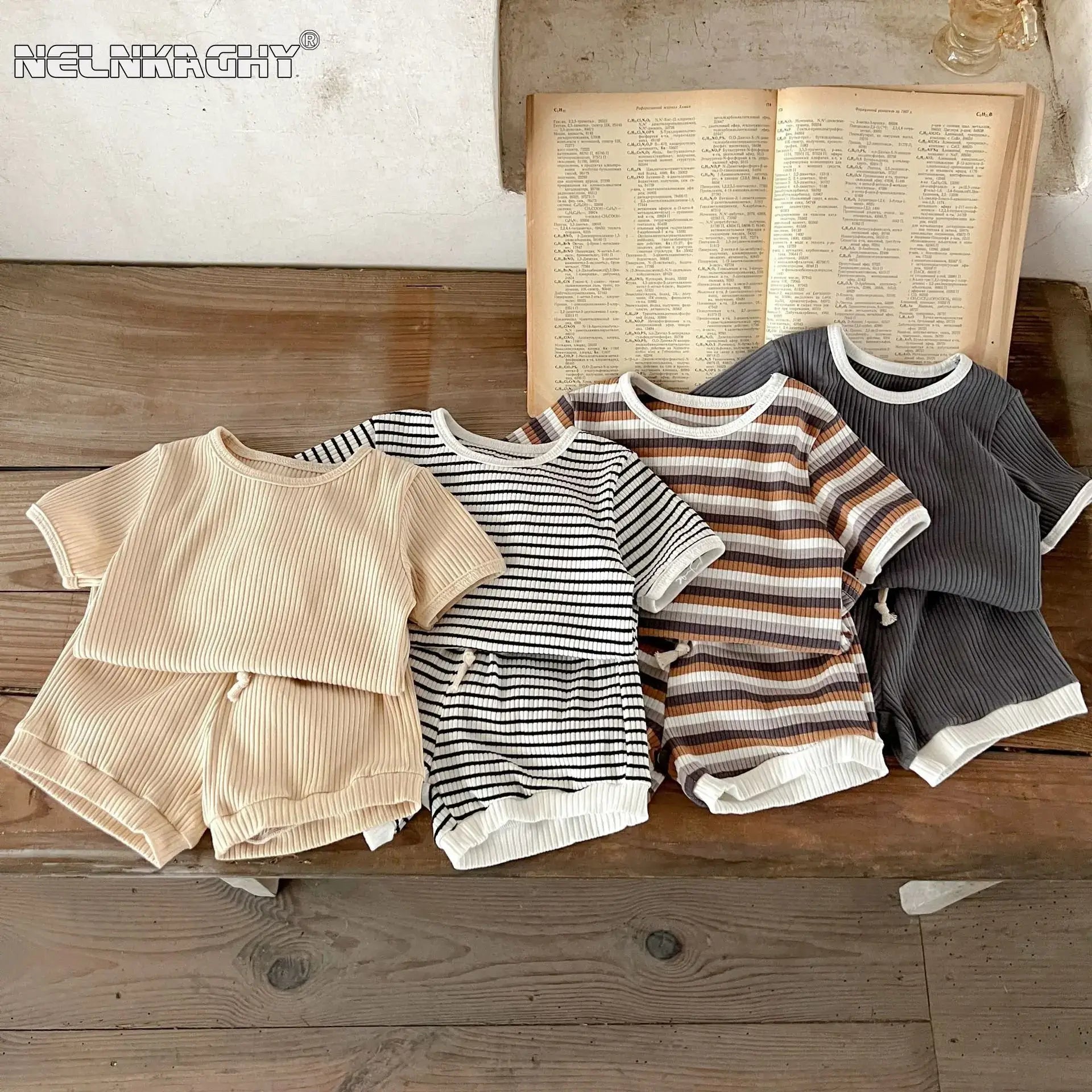 Get ready for warmer weather with these Summer Infant Boys Short Sleeve Striped Tops and Shorts!