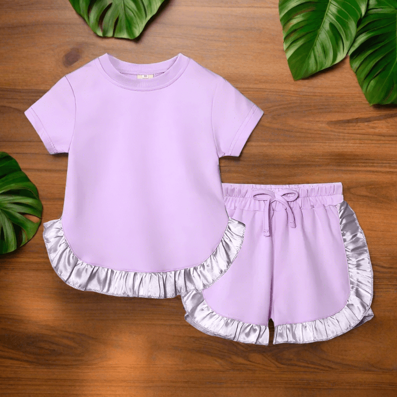 Elevate her summer with our Toddler Girls' Ruffled Top-Shorts set. Perfect for any occasion, crafted for comfort and style. 