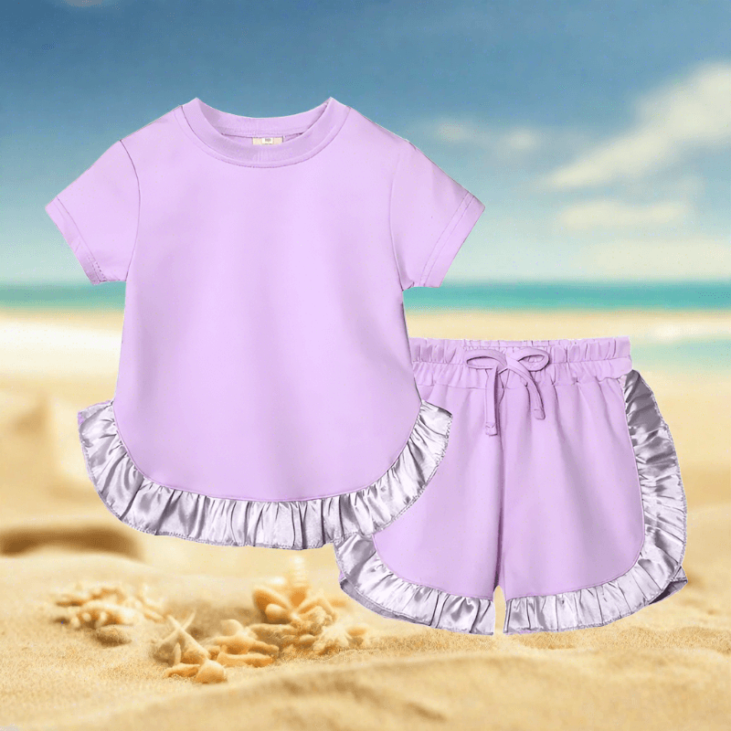 Elevate her summer with our Toddler Girls' Ruffled Top-Shorts set. Perfect for any occasion, crafted for comfort and style. 