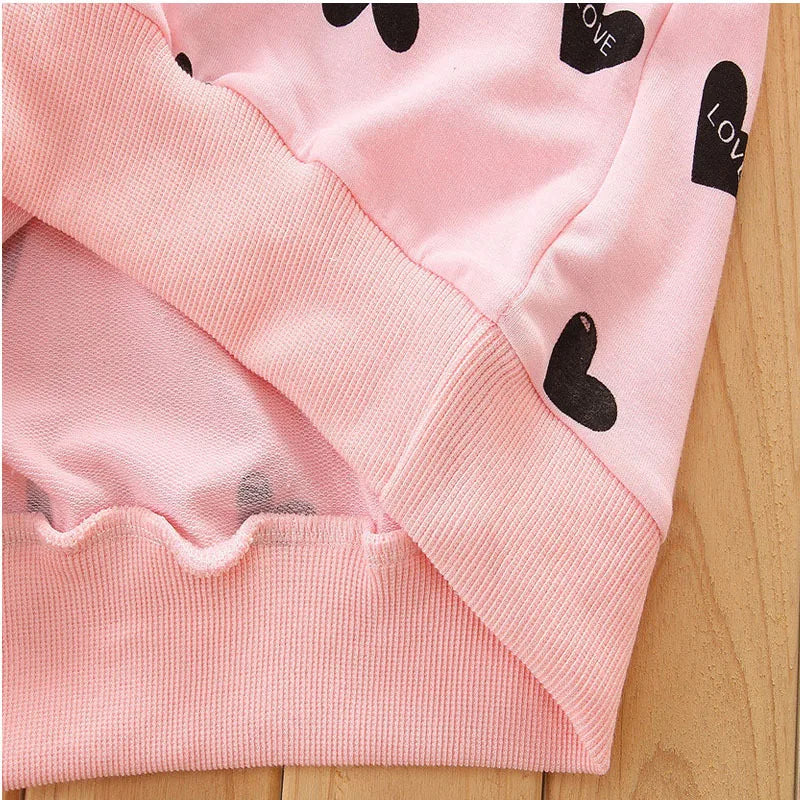 Dress your little sweetheart in this adorable Toddler Girls Autumn Heart Sweatshirt-Skirt Leggings featuring a heart-print sweatshirt, skirt, and leggings made from soft polyester. 