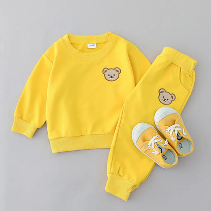 Let your little one's new favorite cozy combo be the Infant Winter Teddy Bear Face Sweatshirt and Pants! This adorable two-piece set features a cuddly teddy bear face sweatshirt paired with matching pants.