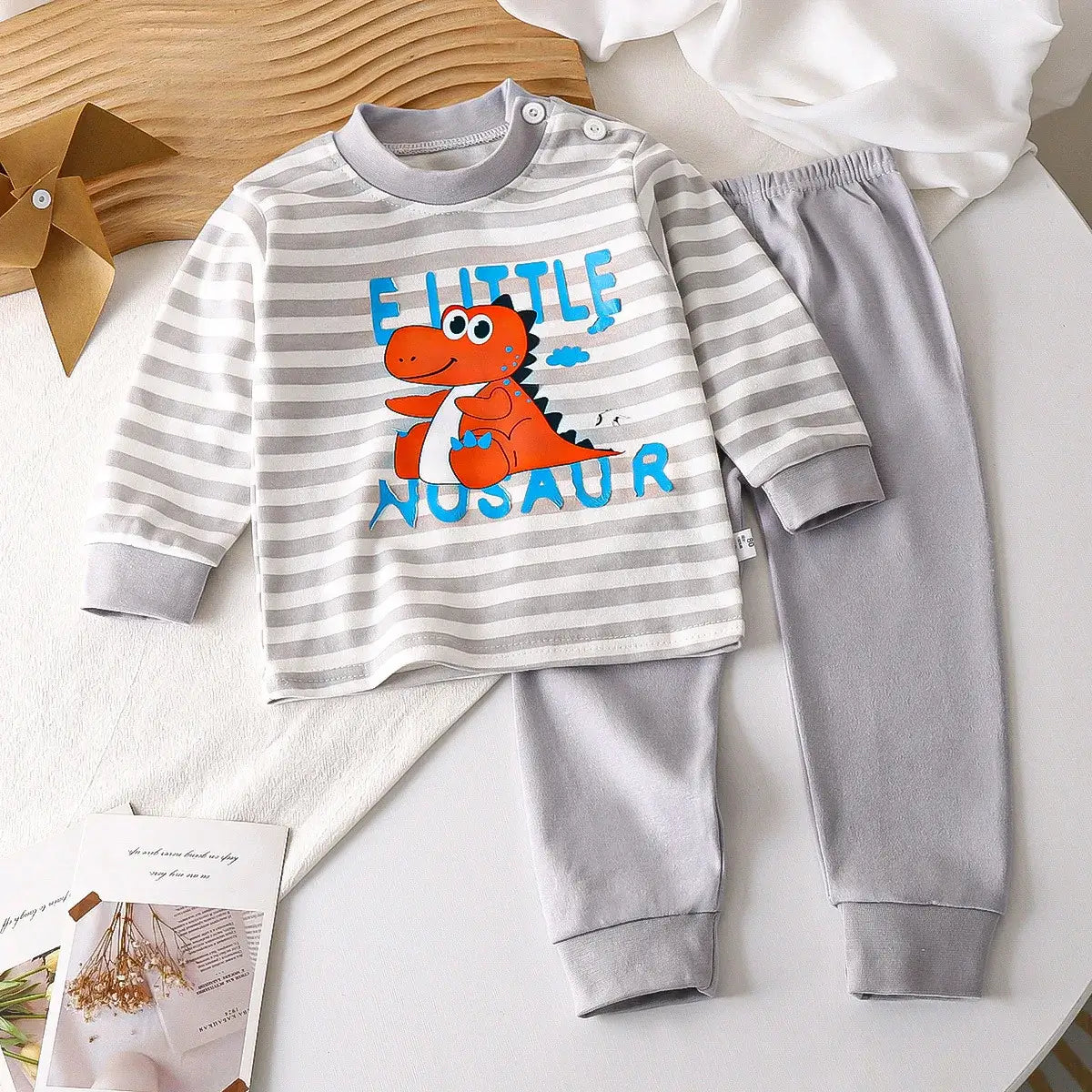 Keep your little one cozy and cute in this Autumn Toddlers Long Sleeve 2PC Pajama Set. Made from soft combed cotton, this Autumn Toddlers Long Sleeve 2PC Pajama Set is breathable enough to keep skin happy and irritation-free—because cranky jammies are no