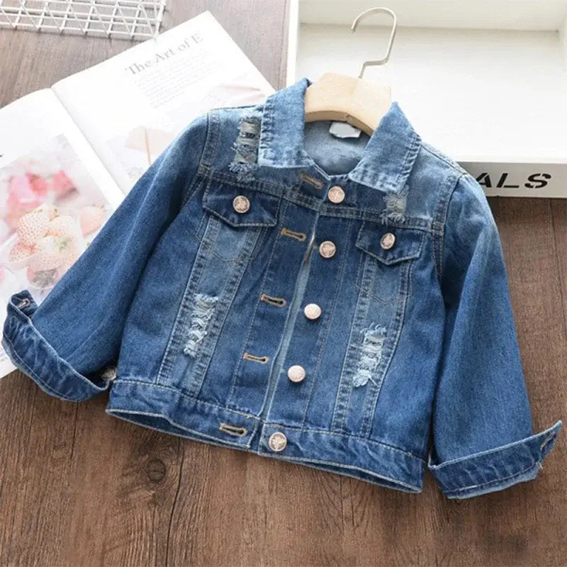 Sprinkle some magic into your child's wardrobe with our Girls Fashion Cartoon Unicorn Denim Jacket.