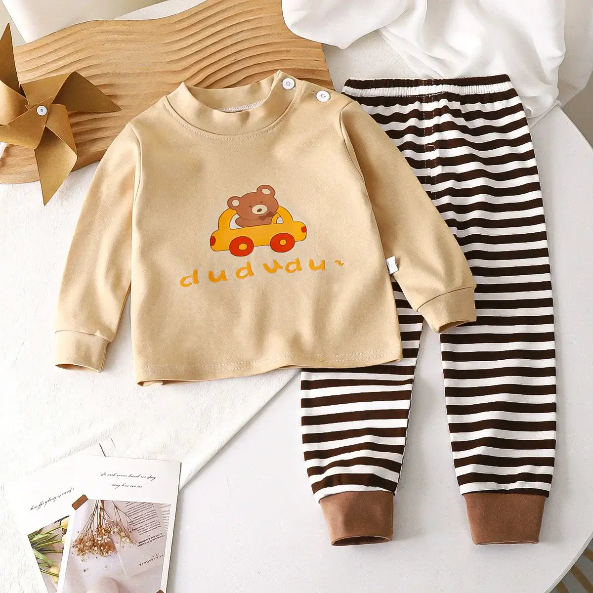 Keep your little one cozy and cute in this Autumn Toddlers Long Sleeve 2PC Pajama Set. Made from soft combed cotton, this Autumn Toddlers Long Sleeve 2PC Pajama Set is breathable enough to keep skin happy and irritation-free—because cranky jammies are no