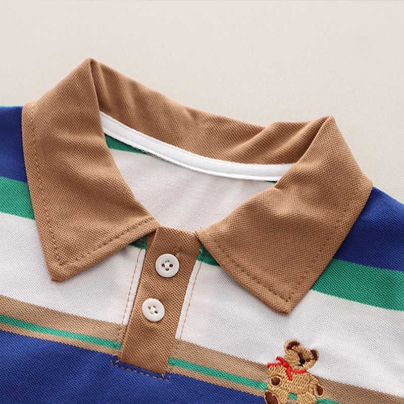 Get your little boy ready for summer with our Summer Toddler Boys Striped Bear Polo Shirt and Denim Shorts set.