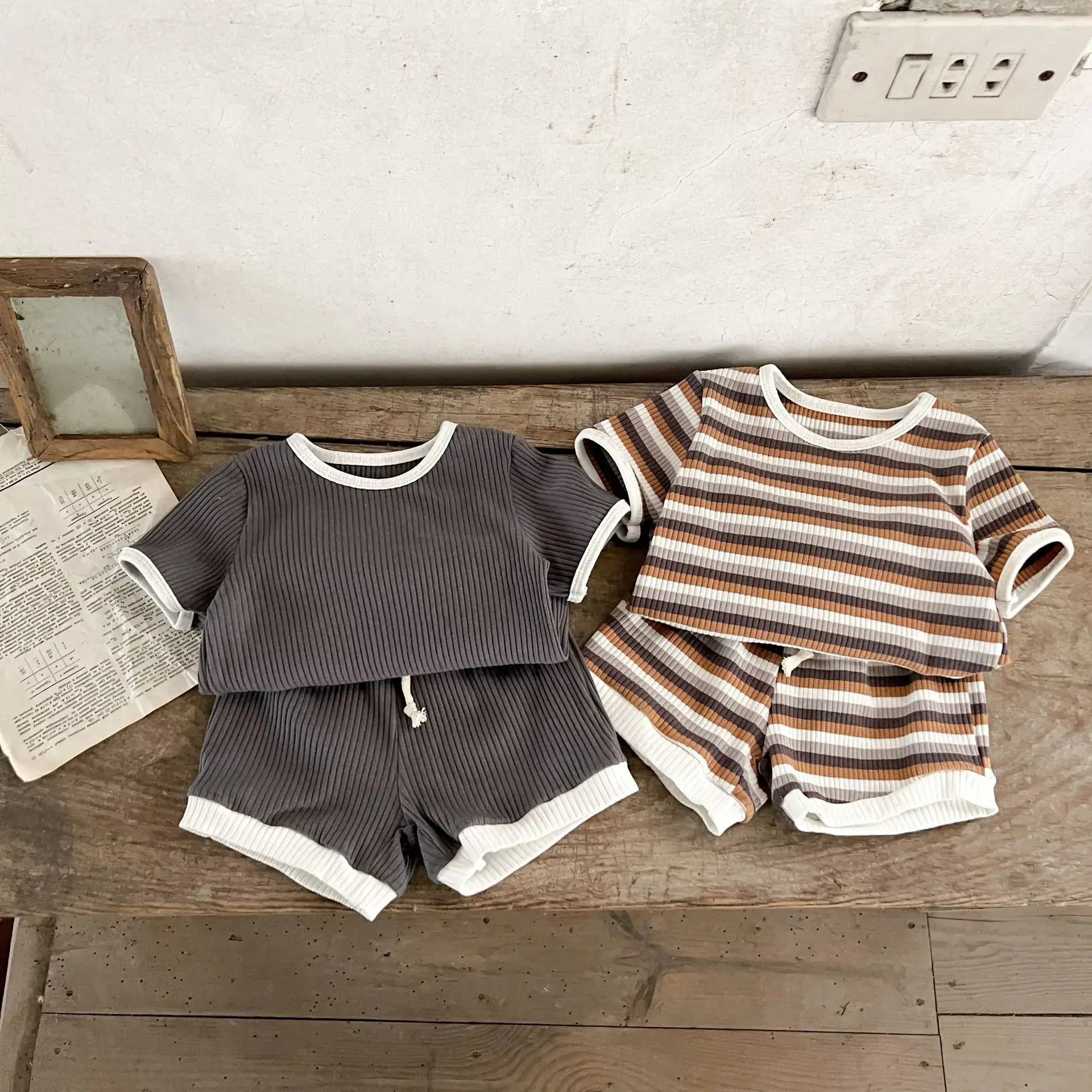 Get ready for warmer weather with these Summer Infant Boys Short Sleeve Striped Tops and Shorts!