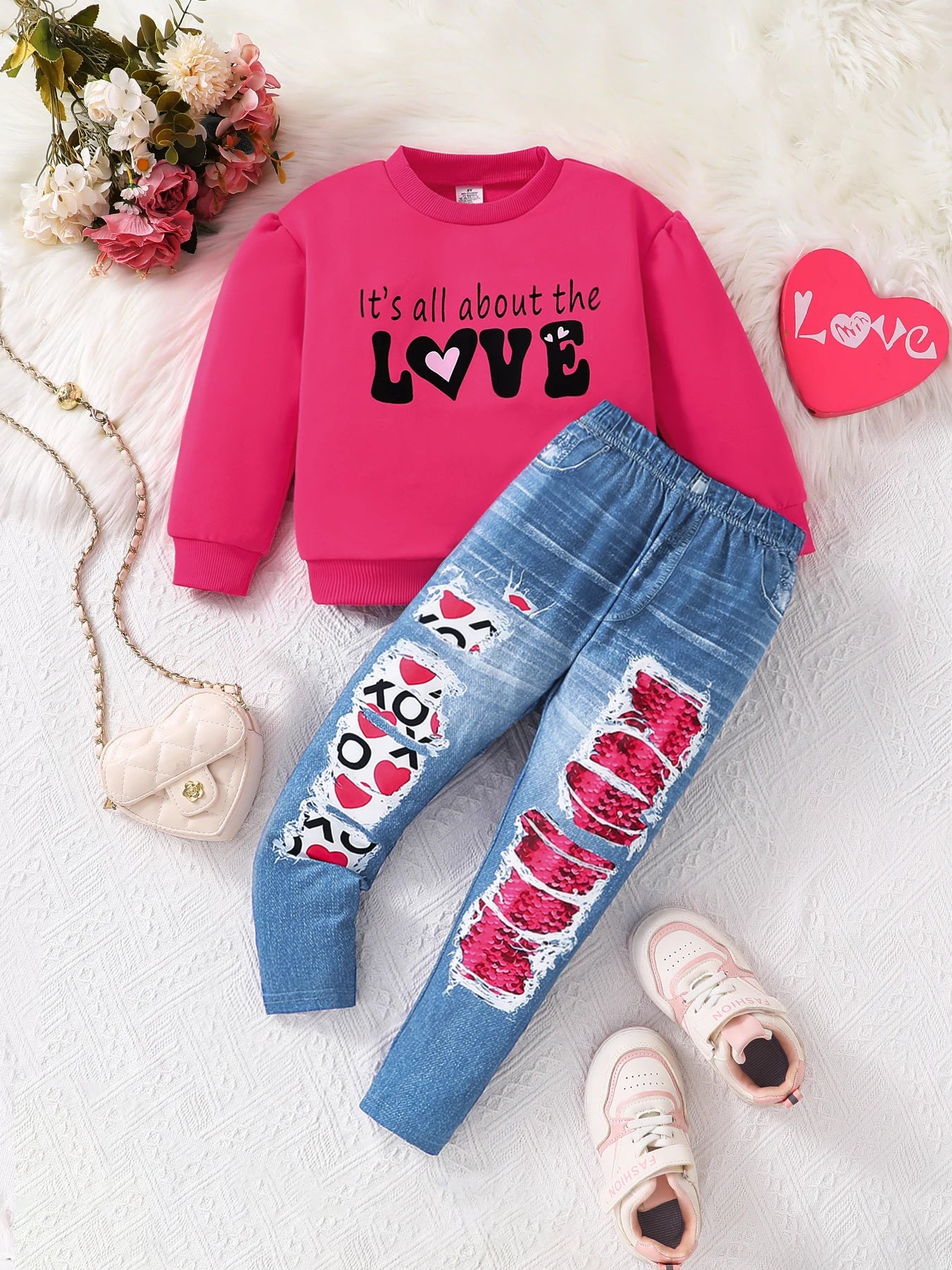 Get ready for spring with this fashionable pink knitted top and blue denim pants set for girls aged 4-8 years. 