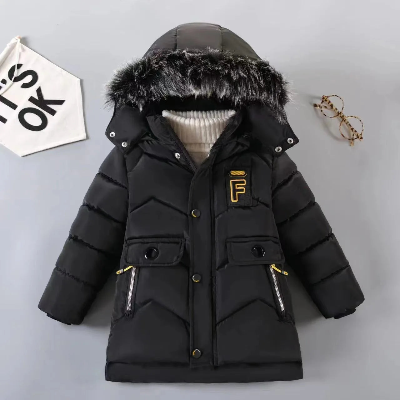 Stay warm and stylish this winter with our Winter Boys Solid Color Hooded Down Coat!