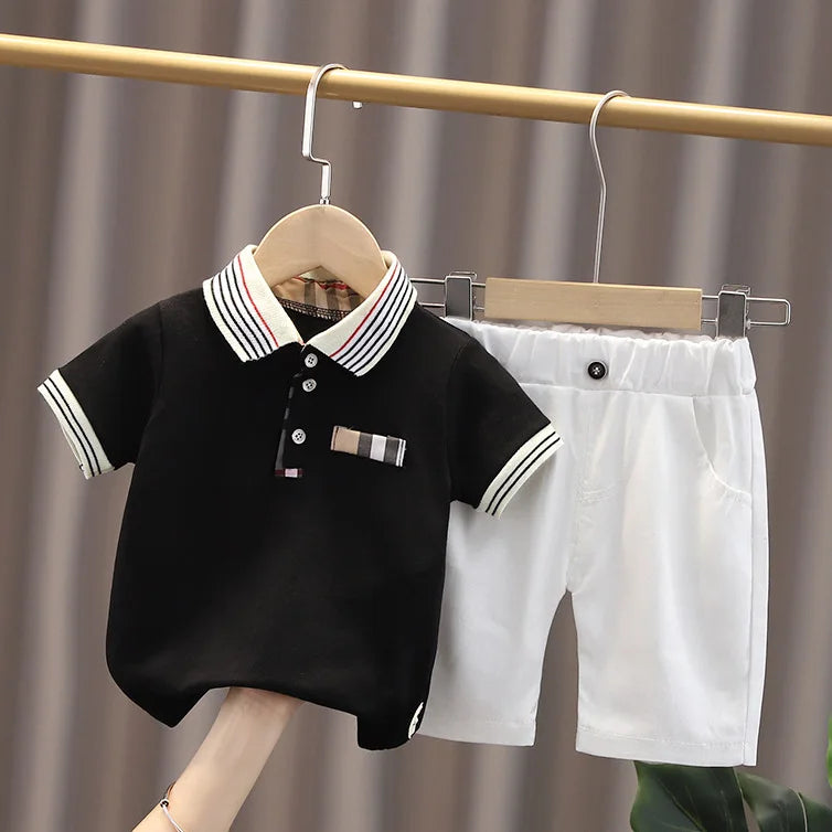 Upgrade your little one's wardrobe with our sophisticated Summer Toddler Boys Polo Shirt & Shorts 2PC Set.