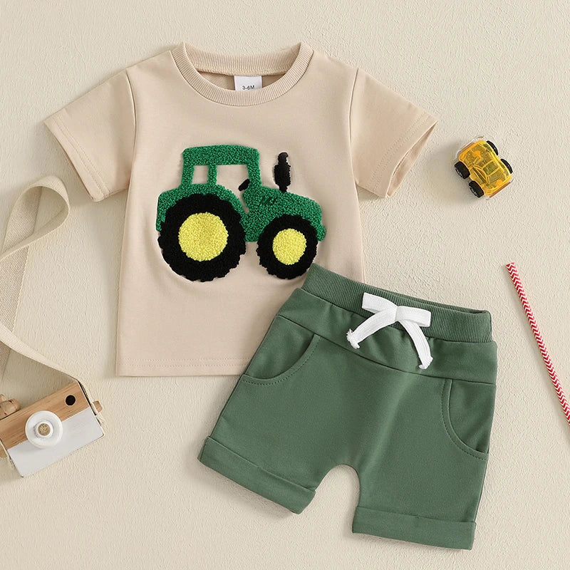 The Summer Toddler Boys Embroidered T-Shirt and Elastic Waist Shorts set is perfect for your little one's summer adventures.