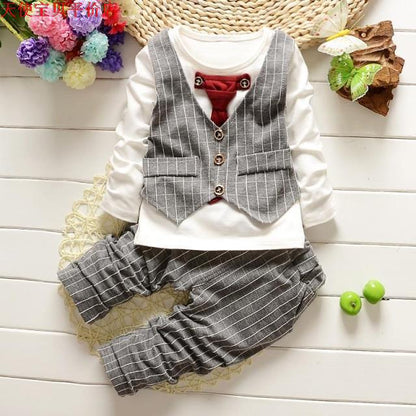 Dress your toddler to impress with this stylish long-sleeve, button-up shirt with bow tie and matched pants!