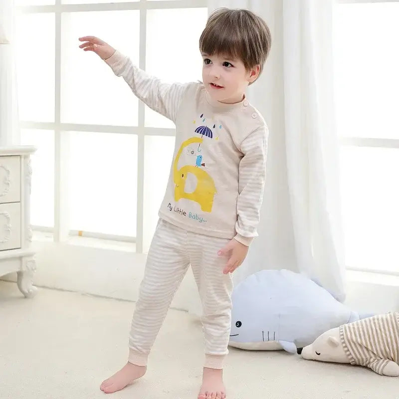 Keep your little one cozy and cute with this Toddler Kids Long Sleeve Cartoon Sleepwear 2PC Set. Made from soft cotton, these pajamas fit true to size