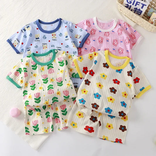 Keep your little ones cool and stylish this summer with our Summer Toddler Kids Cartoon Print Short Sleeve Tops and Shorts.