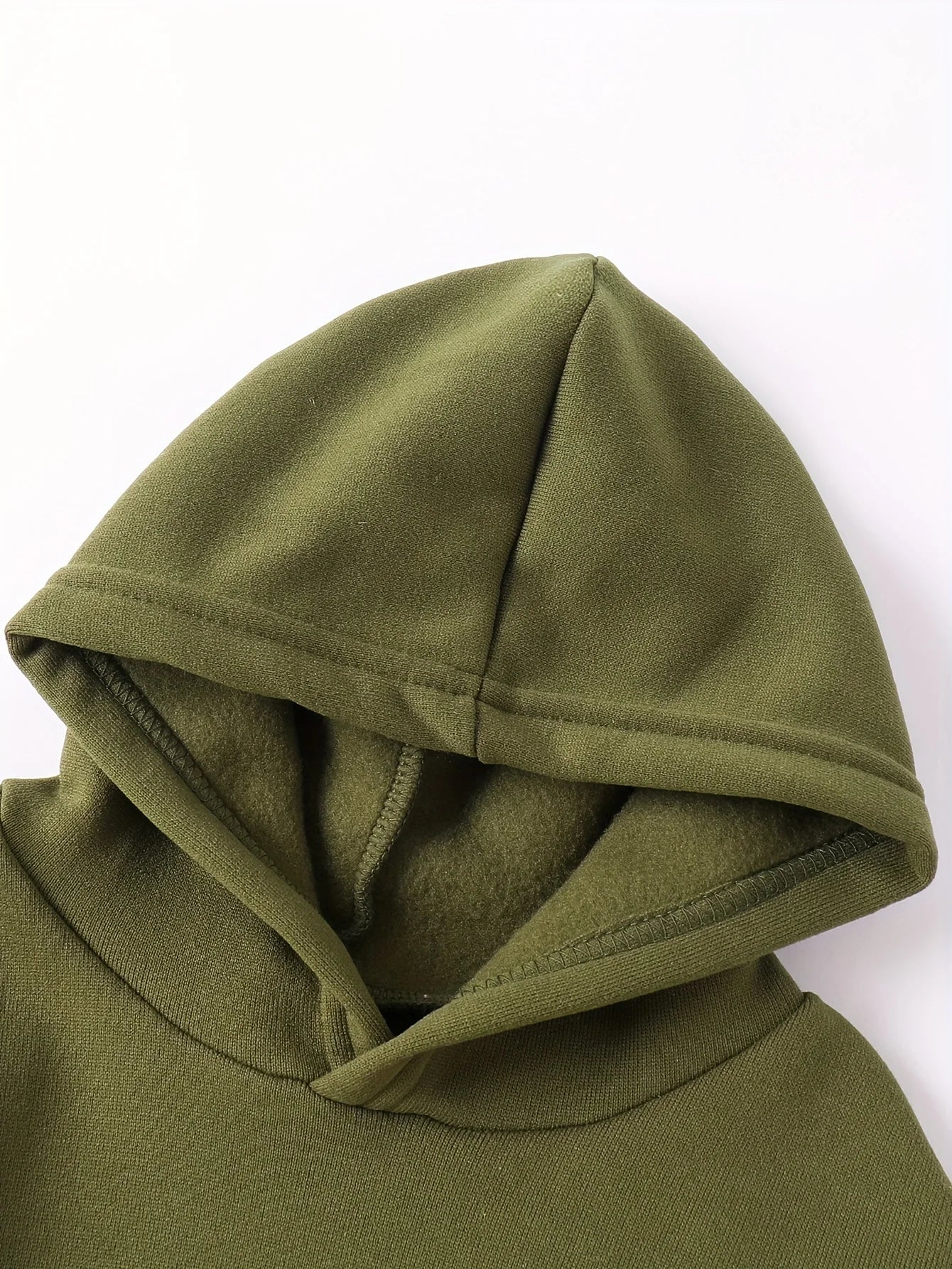 Your little man will love snuggling into this adorable Toddler Boys JUST A BOY Printed Fleece Sweatsuit—think of it as wearable comfort.