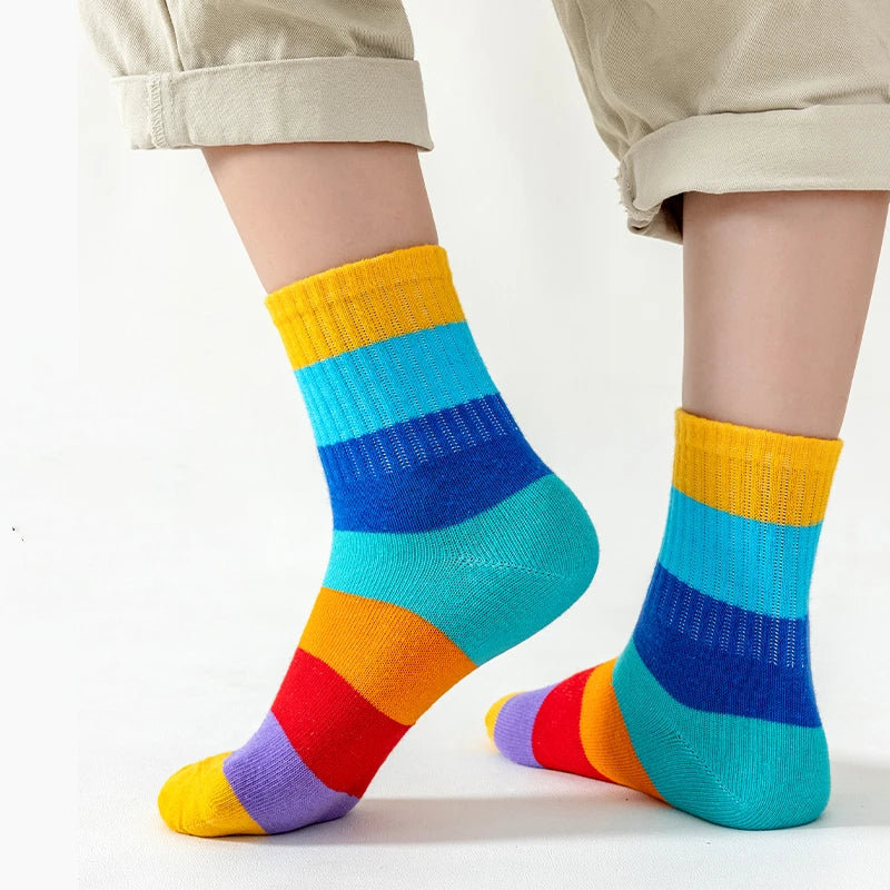 Introduce your little ones to colorful fun with our Kids Fun Rainbow 7 Color Stripes Tube Socks 5PK!