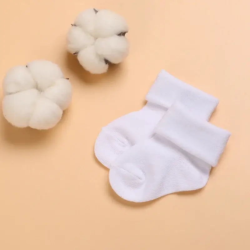 Wrap your little one's feet in comfort and cuteness with our Newborn White Lovely Cotton Baptism Socks!