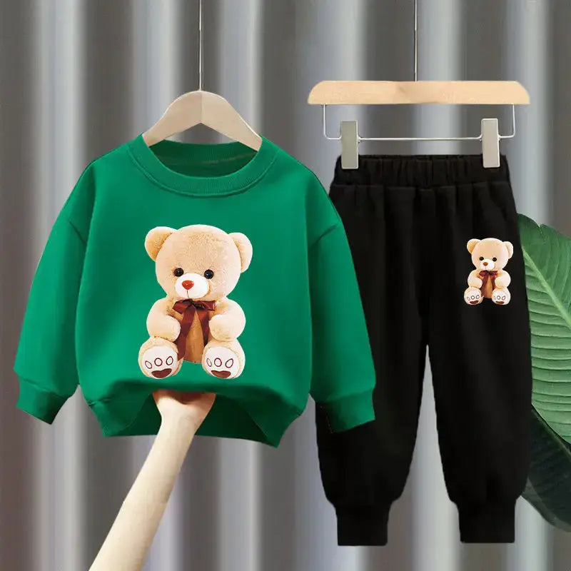 Get your little one ready for the colder months with our Winter Girls Cartoon Bear Printed Sweatshirt & Pants set!