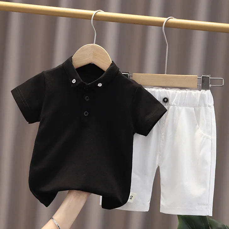 Upgrade your little one's wardrobe with our sophisticated Summer Toddler Boys Polo Shirt & Shorts 2PC Set.