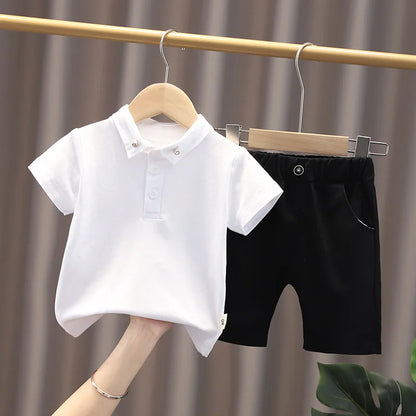 Upgrade your little one's wardrobe with our sophisticated Summer Toddler Boys Polo Shirt & Shorts 2PC Set.